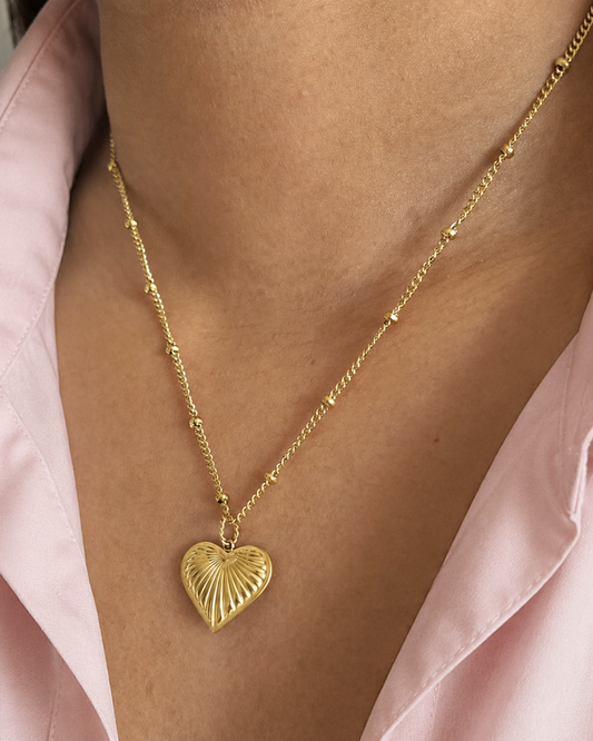 Le Solstice — Collier pendentif cœur rayons dorés en acier inoxydable | Maison Orynn