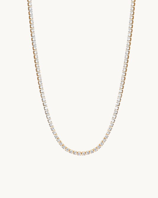 L'Éclat Continu Doré — Collier tennis cristaux chaîne dorée en acier inoxydable | Maison Orynn