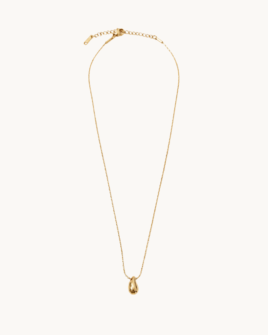 L'Étincelle Doré — Collier pendentif goutte dorée en acier inoxydable | Maison Orynn