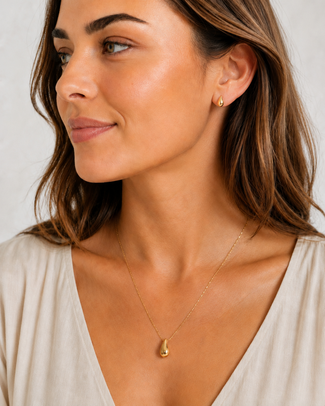 L'Étincelle Doré — Collier pendentif goutte dorée en acier inoxydable | Maison Orynn